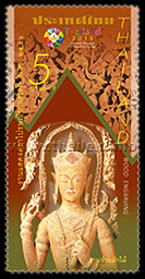 wood-carved statue of a door guardian on door panel of Wat Phra Sri Sanphet