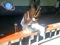 Old Chinese Playing the Sheng (Reed Mouth Organ)
